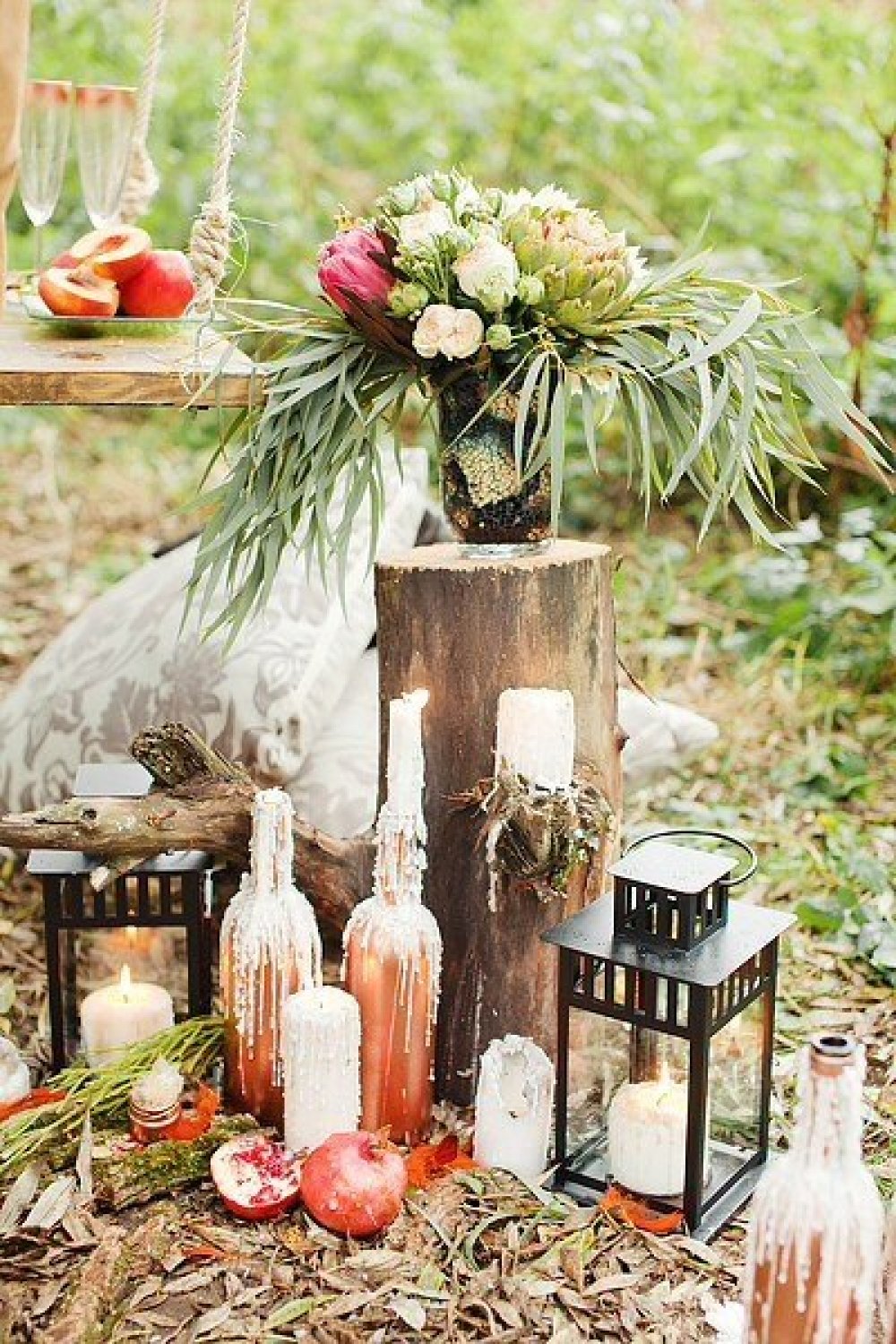 Бутылки в декоре свадебной фотозоны